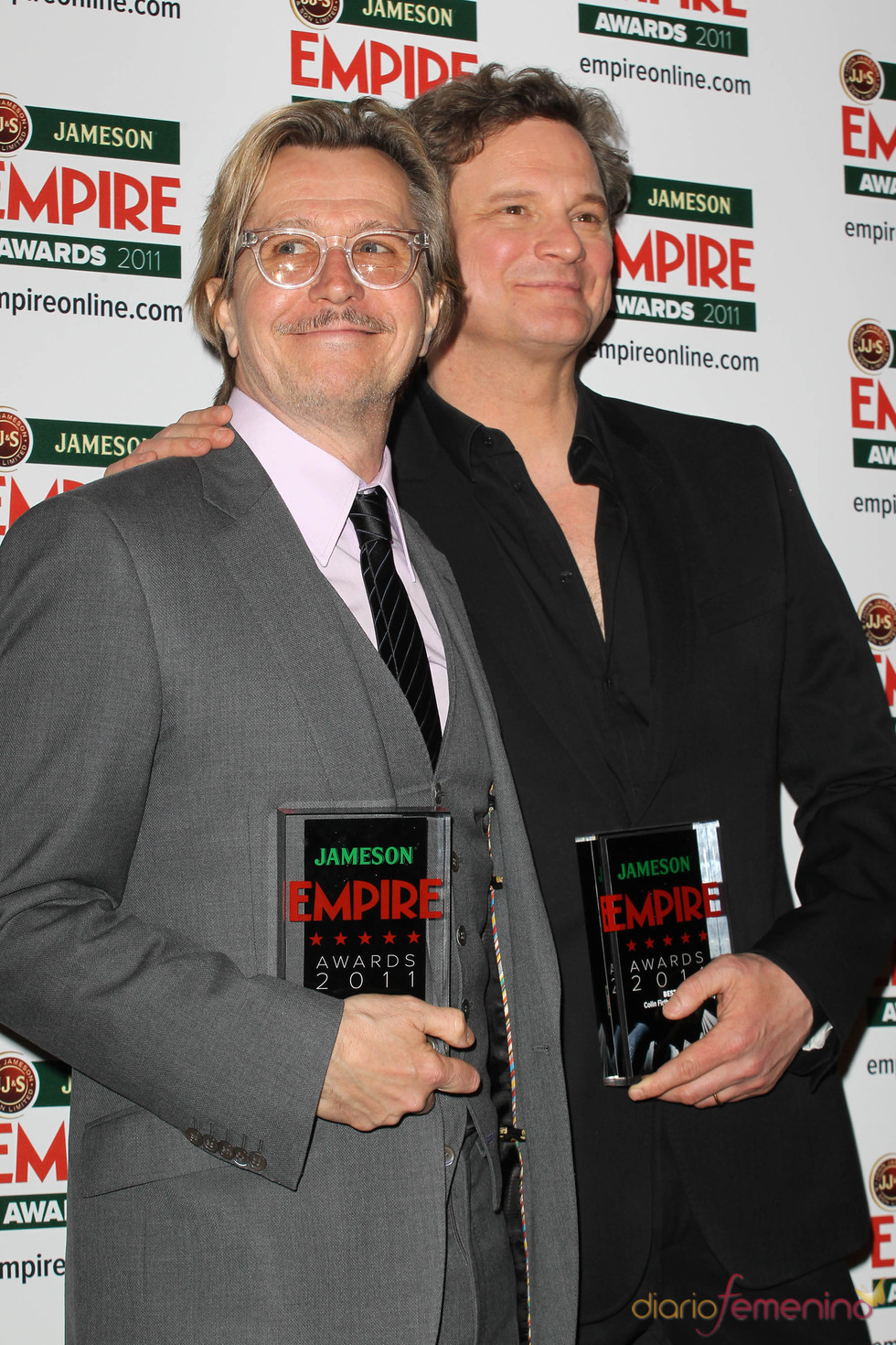Colin Firth y Gary Oldman en los Premios Empire