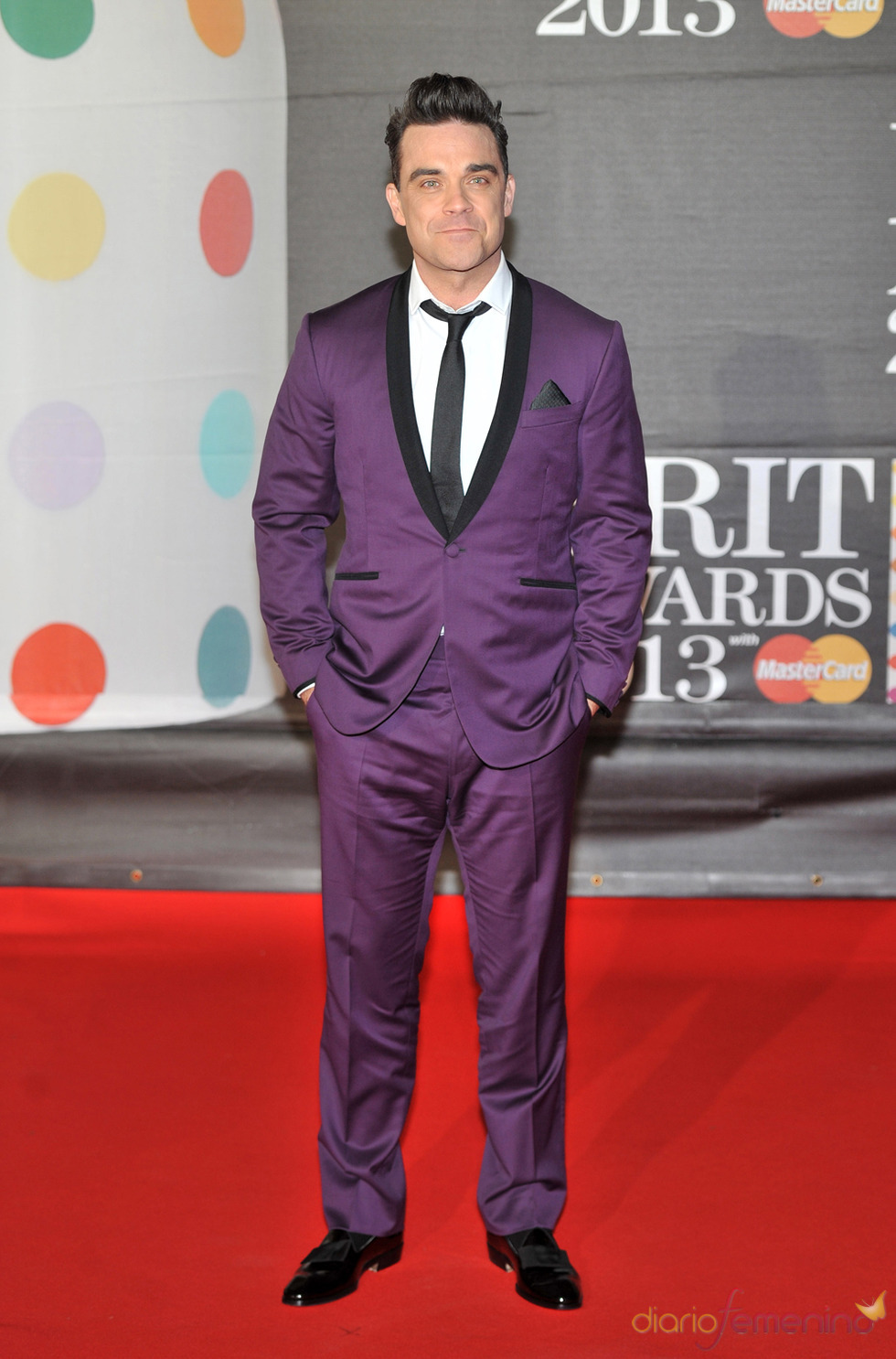 Robbie Williams en la alfombra roja de los Brit 2013