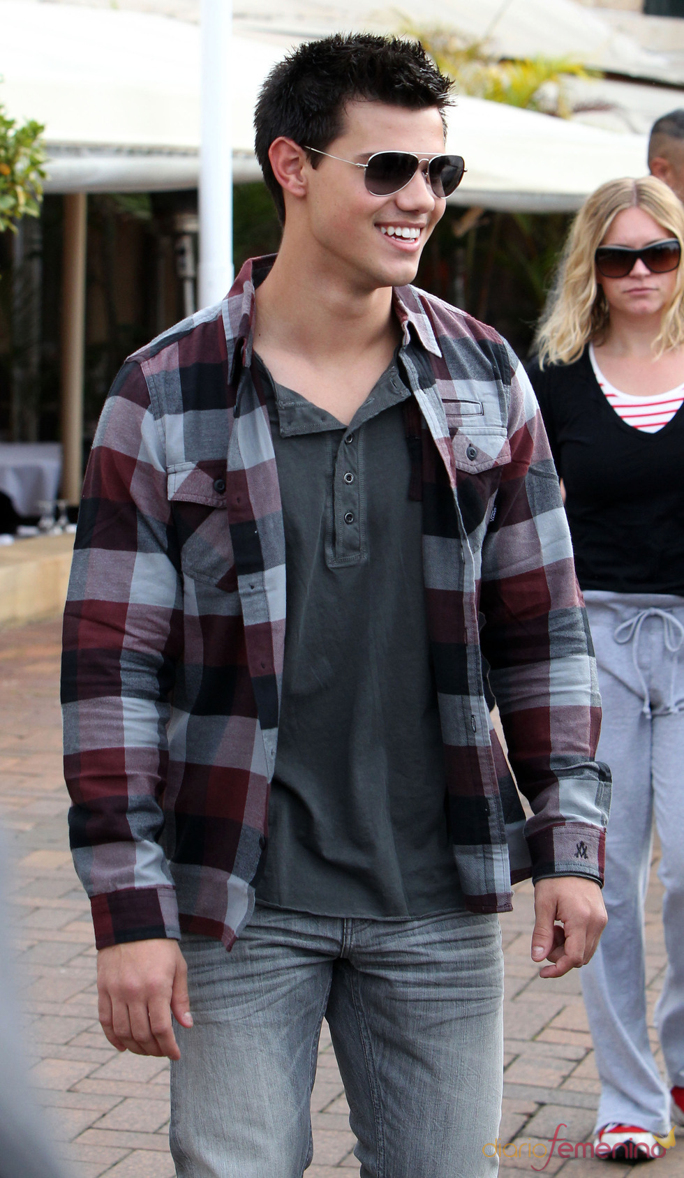 Taylor Lautner, muy sonriente en Sidney