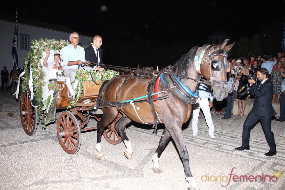 Tatiana Blatnik en coche de caballos