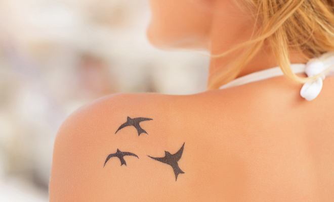 pajaros volando tatuaje