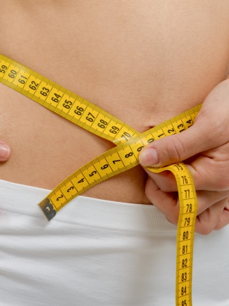 Calcular el peso ideal de acuerdo con el peso y la altura de la mujer