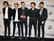 One Direction se mete en un lío: a juicio por Midnight Memories