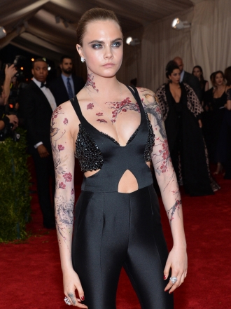 Los tatuajes de Cara Delevingne