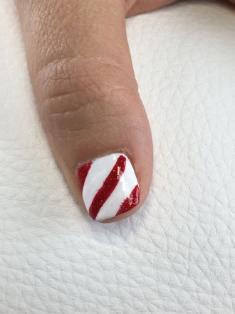 Diseño de uñas rápido de caramelo de Navidad