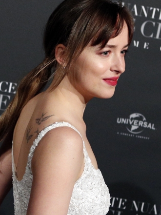 Los misteriosos tatuajes de Dakota Johnson: descubre su significado