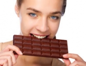 Efectos en la cara del chocolate, la grasa y el dulce