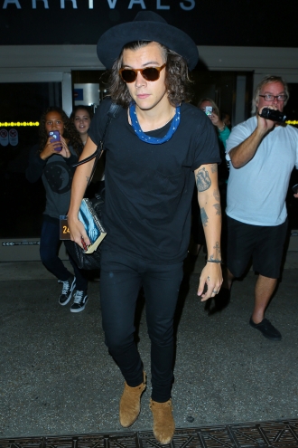 Las siempre particulares pintas de Harry Styles