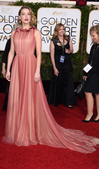 Amber Heard, radiante y estupenda