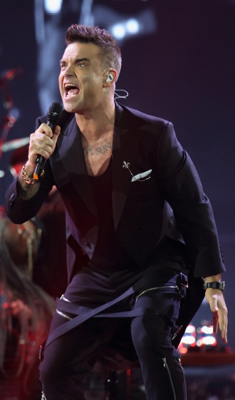 Robbie Williams, una fiera en el escenario