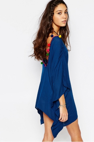 Caftán con pompones