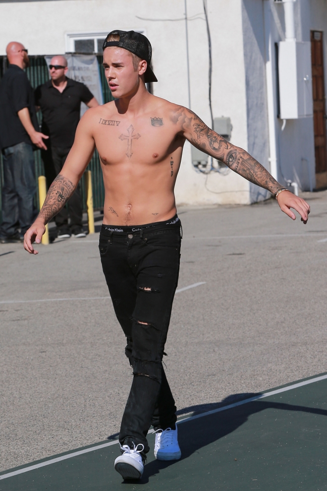 Justin Bieber, loco por los tatuajes