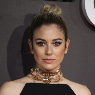 Peinados de Blanca Suárez: un moño top knot