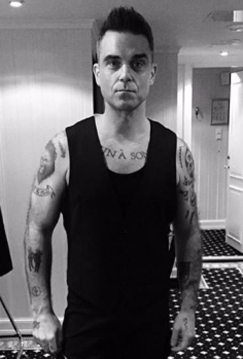Significado de los tatuajes de Robbie Williams